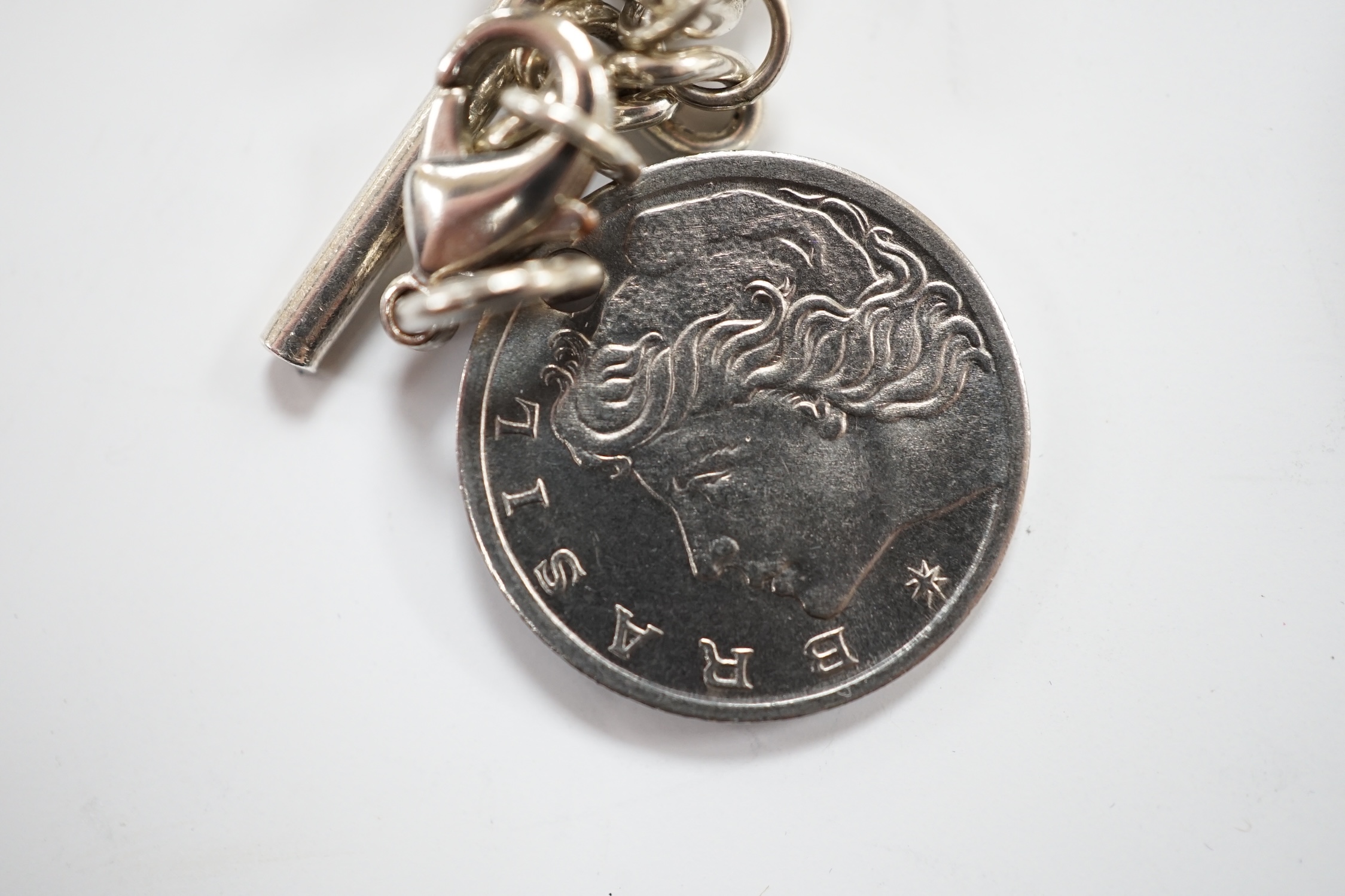 A German 900 standard cased Omega keyless open face dress pocket watch, with Arabic dial and subsidiary seconds, case diameter 48mm, together with an unmarked white metal albert.